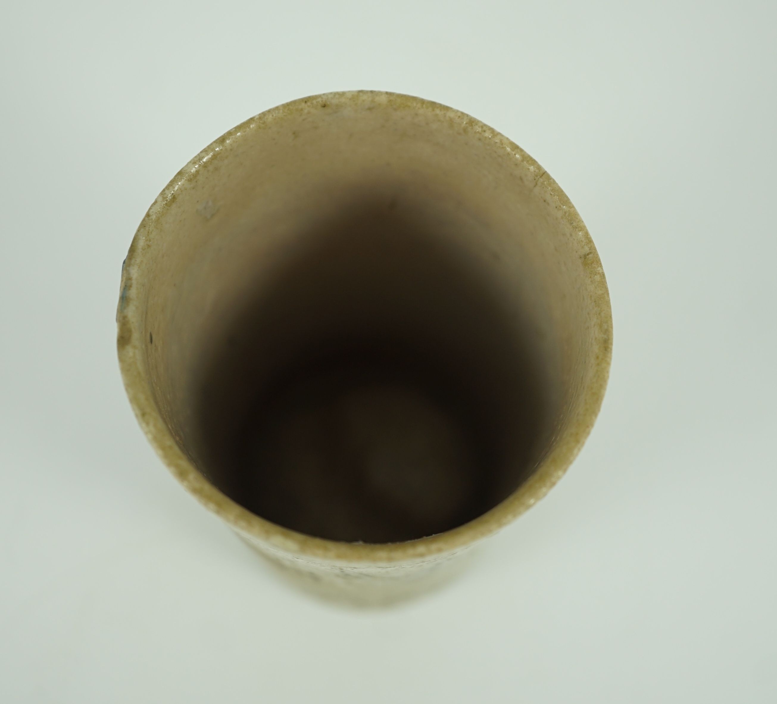 A Martin Brothers ‘grotesque fish’ beaker, dated 1914, 8.7cm high, hairline crack